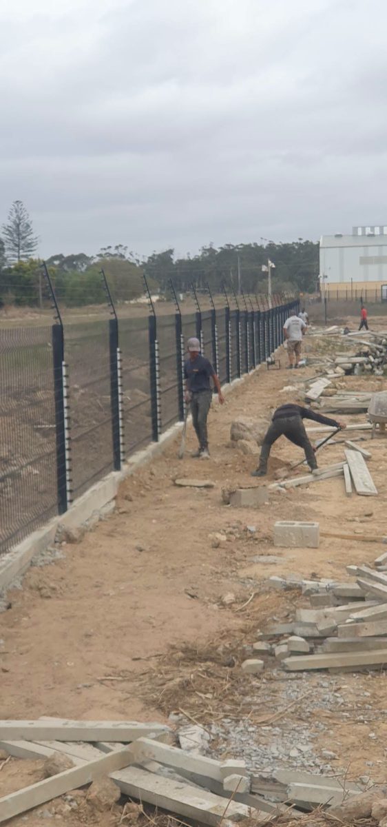 Clear view fencing installation along a property boundary